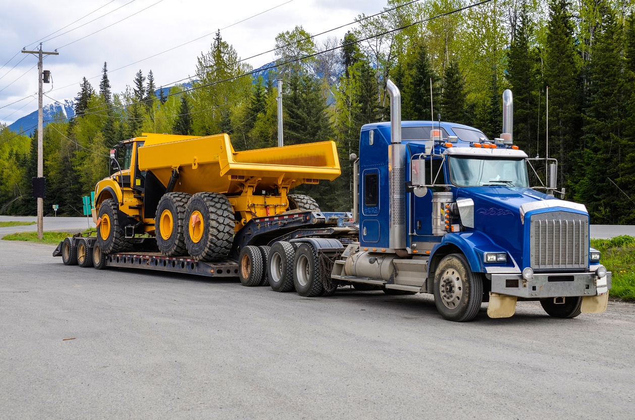 Heavy equipment transport lowboy trailer.