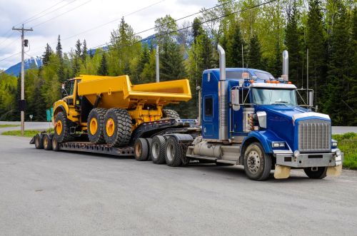 Heavy equipment transport lowboy trailer.